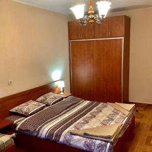 Katil atau katil-katil dalam bilik di Приключение в Триград