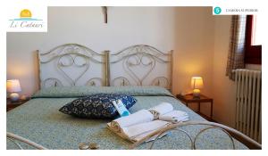 A bed or beds in a room at Li Catauri