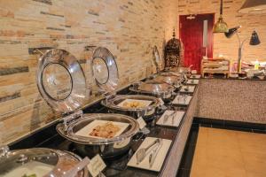 Restoran või mõni muu söögikoht majutusasutuses Dhafra Beach Hotel