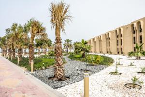 Zahrada ubytování Dhafra Beach Hotel