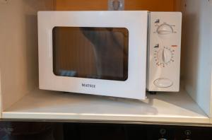 TV a/nebo společenská místnost v ubytování Apartment Comfort