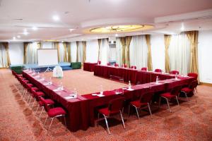 The business area and/or conference room at The Bellezza Hotel Suites