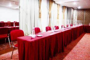 The business area and/or conference room at The Bellezza Hotel Suites
