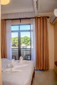 Postel nebo postele na pokoji v ubytování Hotel Comster Mtwapa + 37 fotografií