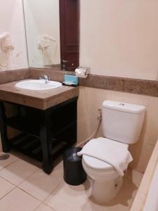 A bathroom at The Bellezza Hotel Suites