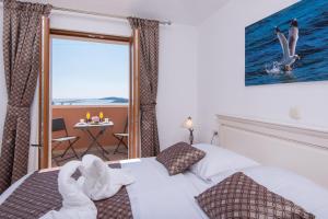 Voodi või voodid majutusasutuse Villa Aria toas +41 fotot