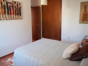 Łóżko lub łóżka w pokoju w obiekcie Apartamento Del Mar Las Negras