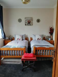 Voodi või voodid majutusasutuse Nest Guesthouse toas