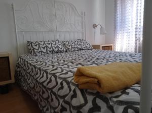 Posteľ alebo postele v izbe v ubytovaní Apartamento TISARE wifi