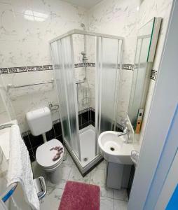 Kúpeľňa v ubytovaní Appartements Belli + 22 fotografií