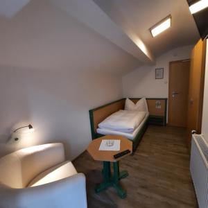 Letto o letti in una camera di Pension Aberger