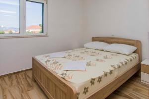 Postel nebo postele na pokoji v ubytování Villa Katarina