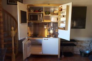 Kuhinja ili čajna kuhinja u objektu Casa Ambiente Rural: En plena Ribera del Duero