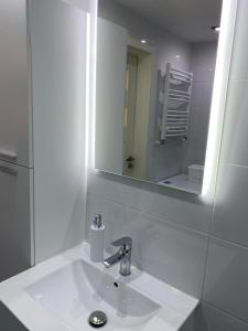 Kúpeľňa v ubytovaní Apartament Witomino Rolnicza