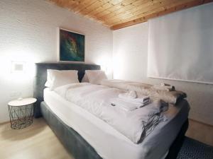 Ένα ή περισσότερα κρεβάτια σε δωμάτιο στο The Seefeld Retreat - Central Family Friendly Chalet - Mountain Views