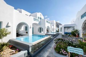 a view of a villa with a swimming pool at Anastasia Princess Luxury Residence - Adults Only in Perissa