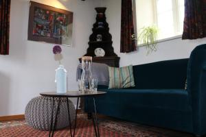 Ein Sitzbereich in der Unterkunft Appartementhotel Blomberger Hof