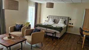 Letto o letti in una camera di Toftastrand Hotell