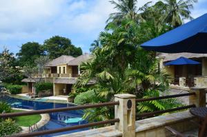 a view of a resort with a swimming pool at Pool Villa Merumatta Senggigi in Senggigi