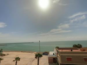 a view of the ocean from a building at Hotel Dakhla Ville in Dakhla