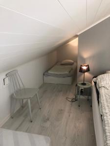 Postel nebo postele na pokoji v ubytování Östernäs