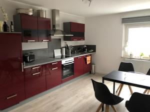 Η κουζίνα ή μικρή κουζίνα στο Body Kult Loft - Modernes Appartement mit 2 separaten Schlafzimmern