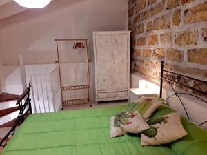 Posteľ alebo postele v izbe v ubytovaní Baglio Reale Apartments