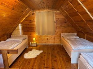 Postel nebo postele na pokoji v ubytování Sport resort Nenudimse