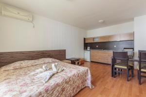 Kuchyň nebo kuchyňský kout v ubytování Guest Apartments Co Morenia