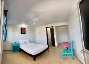 Cama ou camas em um quarto em Blue Coconut Cancun Hotel