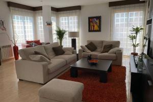 Posezení v ubytování Apartamento Miramar . Amplitud y Comodidad