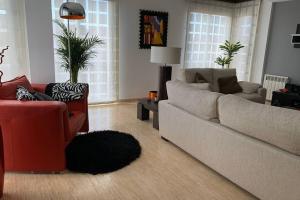 Posezení v ubytování Apartamento Miramar . Amplitud y Comodidad