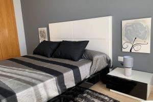Postel nebo postele na pokoji v ubytování Apartamento Miramar . Amplitud y Comodidad