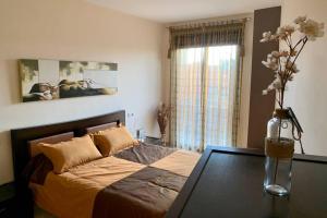 Postel nebo postele na pokoji v ubytování Apartamento Miramar . Amplitud y Comodidad