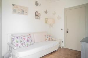 A bed or beds in a room at La Casa Di Menny Maison de Campagne