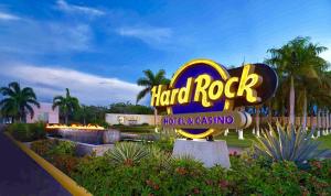 a sign for the hard rock hotel and casino at Apartamento Acceso Directo a la piscina A-108, A-120, A-117 y B-136 in Punta Cana