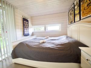 Postel nebo postele na pokoji v ubytování Eagle Bay Lofoten