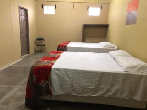 Postel nebo postele na pokoji v ubytování Hotel Casa Vieja