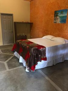 En eller flere senge i et værelse på Hotel Casa Vieja