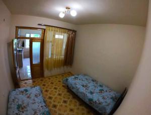 Postel nebo postele na pokoji v ubytování NNN Guest House