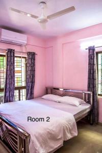 Katil atau katil-katil dalam bilik di Ruby by Olys Apartment