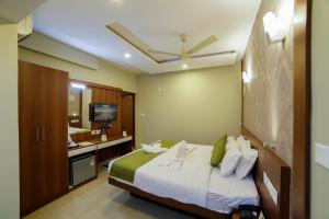 Cama o camas de una habitación en Sreepathi Indraprastha
