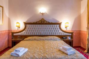 Postel nebo postele na pokoji v ubytování Alexios Luxury Hotel