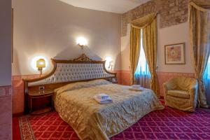 Postel nebo postele na pokoji v ubytování Alexios Luxury Hotel