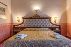 Postel nebo postele na pokoji v ubytování Alexios Luxury Hotel