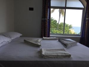 Hope Hostels, Varkala - Helipad客房内的一张或多张床位
