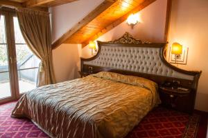 Postel nebo postele na pokoji v ubytování Alexios Luxury Hotel