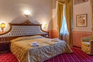 Postel nebo postele na pokoji v ubytování Alexios Luxury Hotel