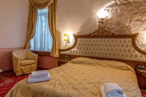 Postel nebo postele na pokoji v ubytování Alexios Luxury Hotel