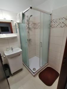 Kúpeľňa v ubytovaní Joós Apartman